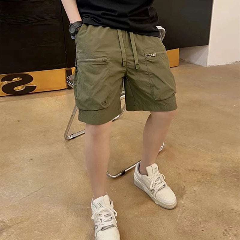 Streetwear Mens Shorts Fashion Patchwork Pockets Design Cargo Shorts For Men Summer New Casual Solid Color Loose Tie-up Shorts