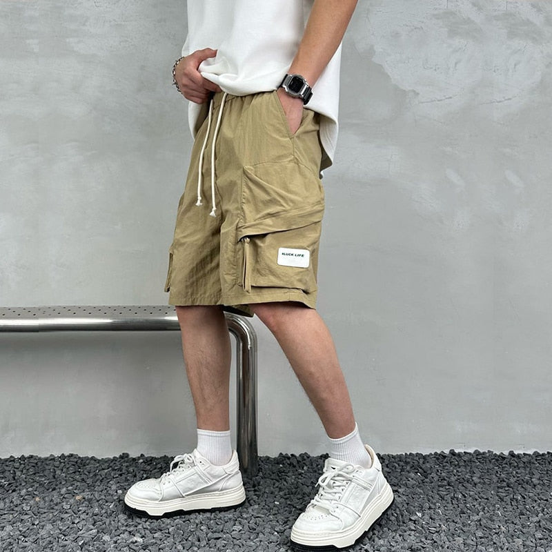 Tooling Shorts Men's Summer Loose Solid Color Five-point Beach Pants Trendy Ins Drawstring Multi-Pocket Short Pants Male