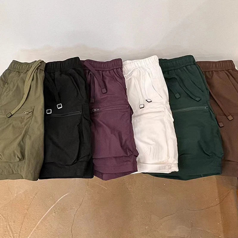 Streetwear Mens Shorts Fashion Patchwork Pockets Design Cargo Shorts For Men Summer New Casual Solid Color Loose Tie-up Shorts