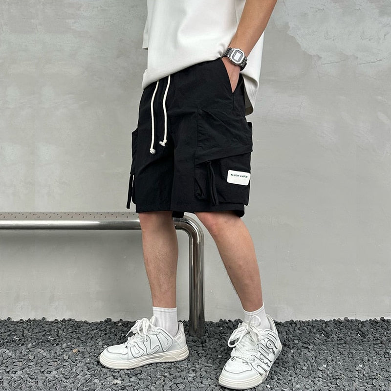 Tooling Shorts Men's Summer Loose Solid Color Five-point Beach Pants Trendy Ins Drawstring Multi-Pocket Short Pants Male