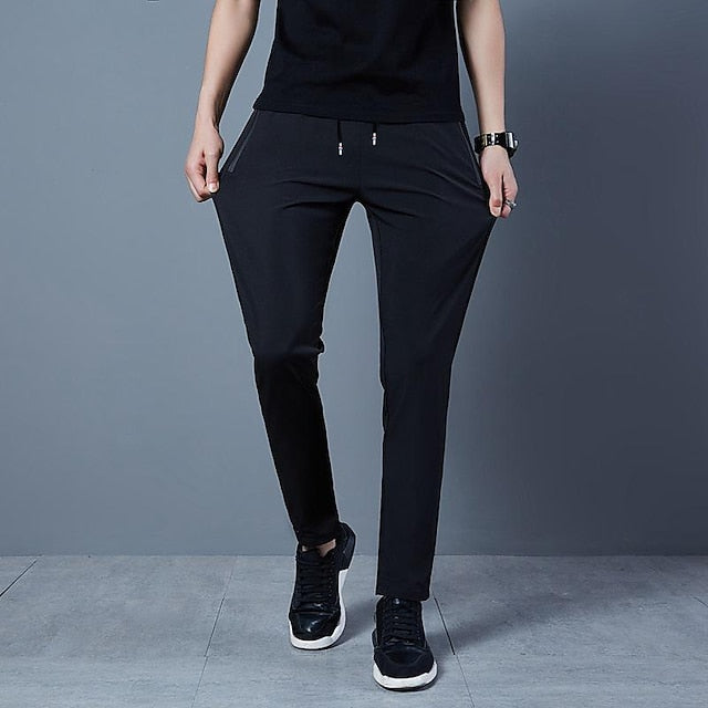 Men's Trousers Casual Pants Drawstring Elastic Waist Zipper Pocket Solid Color Quick Dry Daily Streetwear Classic Casual / Sporty Black Blue