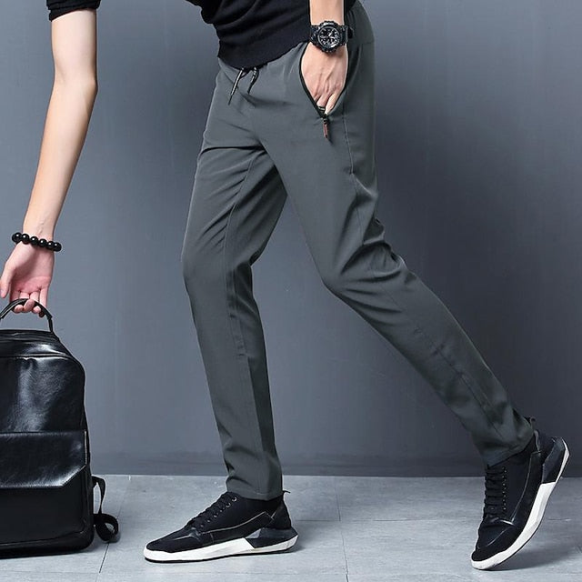 Men's Trousers Casual Pants Drawstring Elastic Waist Zipper Pocket Solid Color Quick Dry Daily Streetwear Classic Casual / Sporty Black Blue